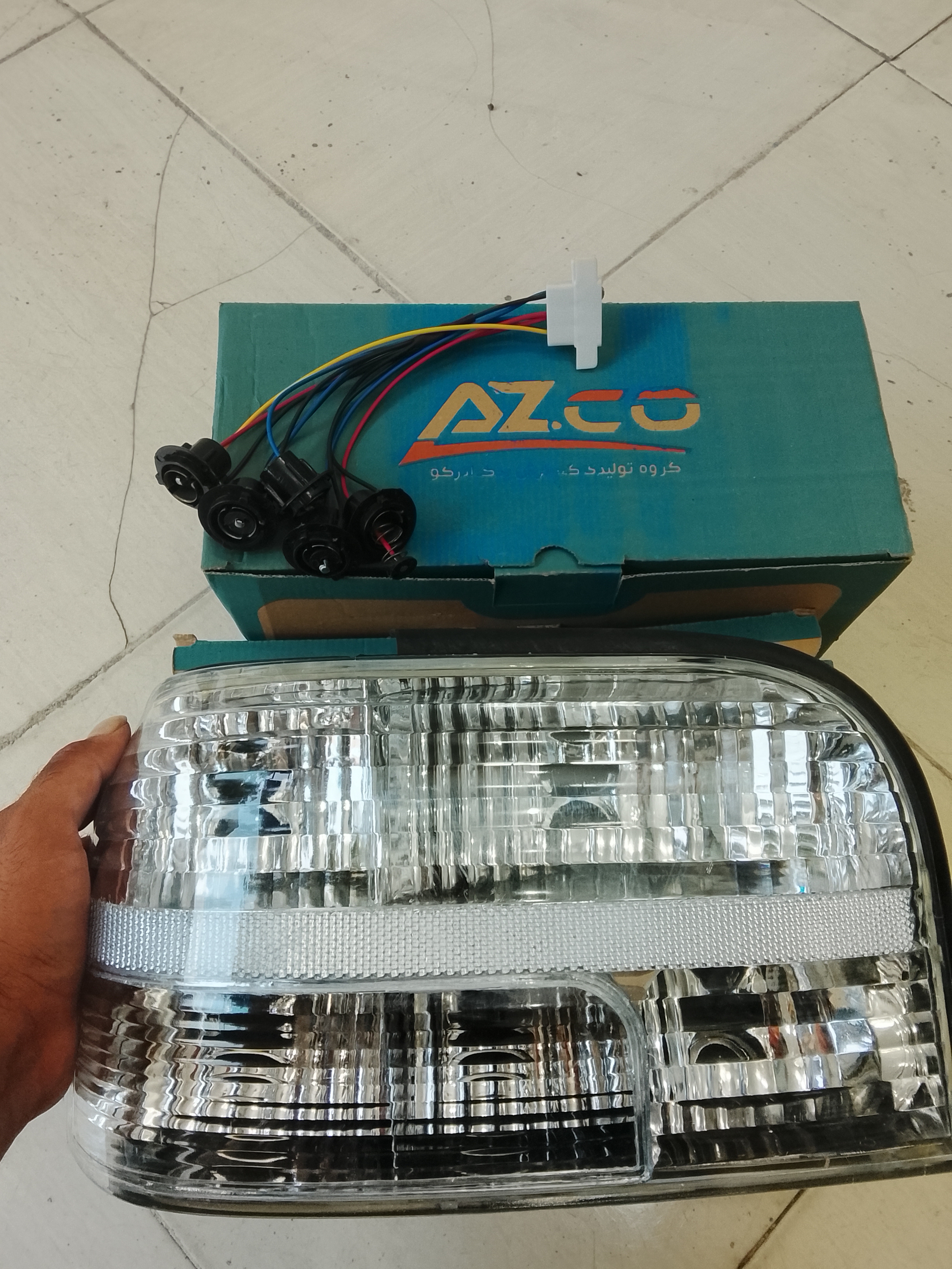 چراغ خطر عقب پراید 131 برفی سمت چپ برند آذرکو
